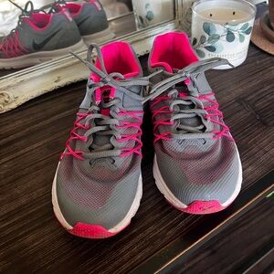 Nike Gray and Pink Athletic Shoes with Cushioned Soles
